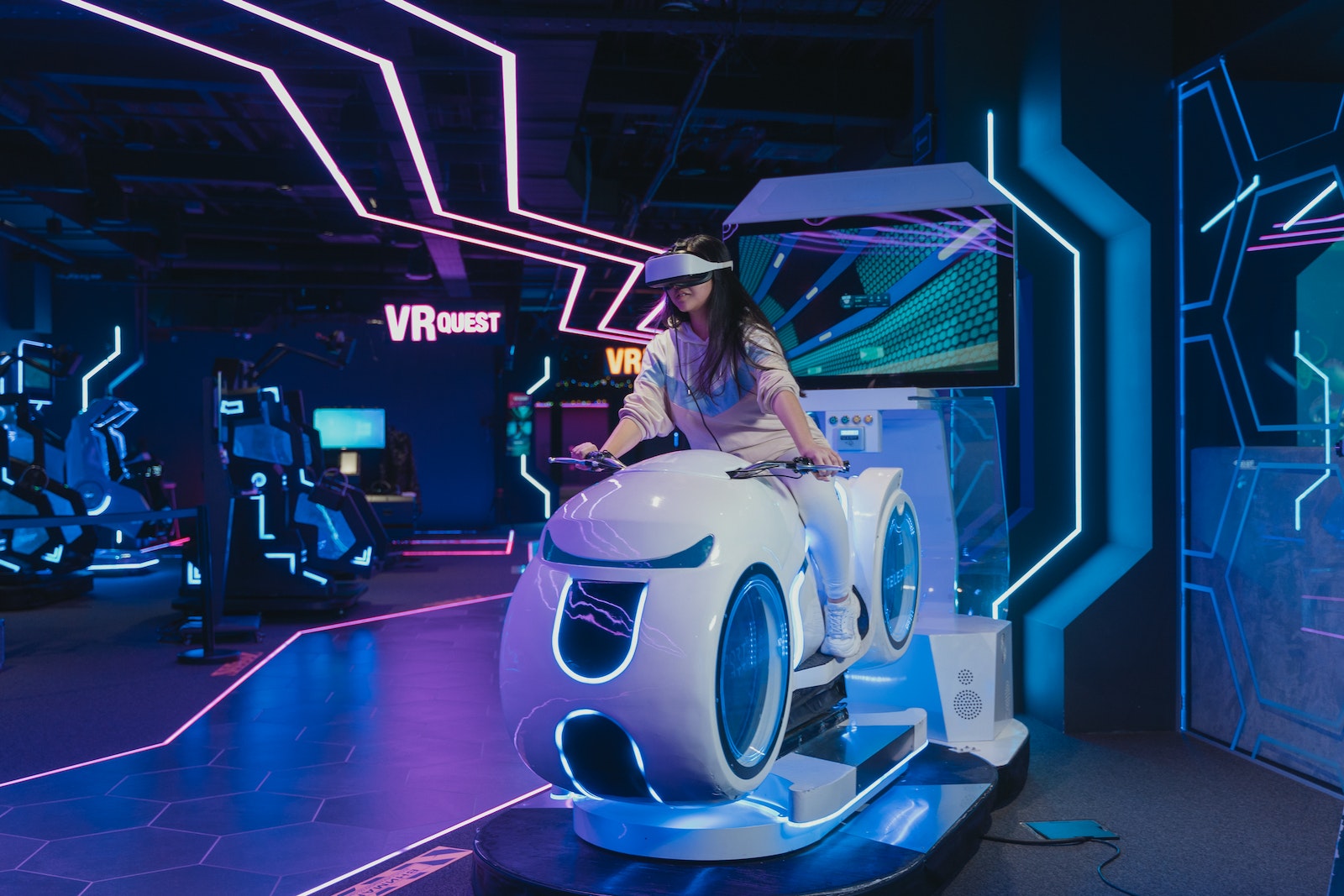 Woman Riding a Virtual Reality Ride